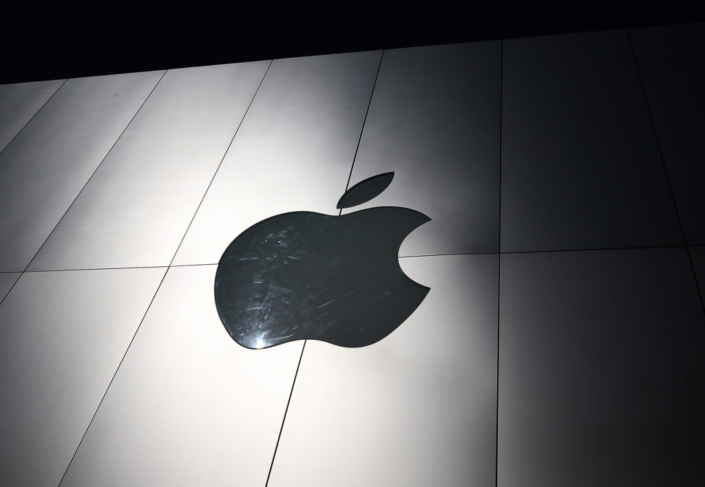 SAN FRANCISCO, CA - APRIL 23:  The Apple logo is displayed on the exterior of an Apple Store on April 23, 2013 in San Francisco, California.  Analysts believe that Apple Inc. will report their first quarterly loss in nearly a decade as the company prepares to report first quarter earnings today after the closing bell.  (Photo by Justin Sullivan/Getty Images)